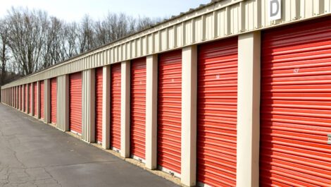 A row of drive-up access storage units at National Mini Storage.