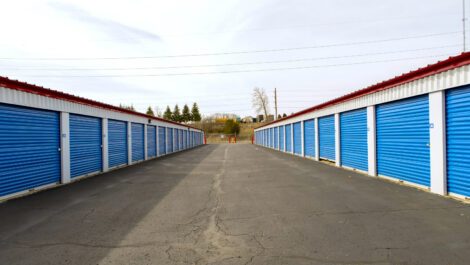 A row of drive-up access storage units at National Mini Storage on KL Ave.