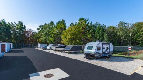 Boats parked in lot of Harbor Park Storage.