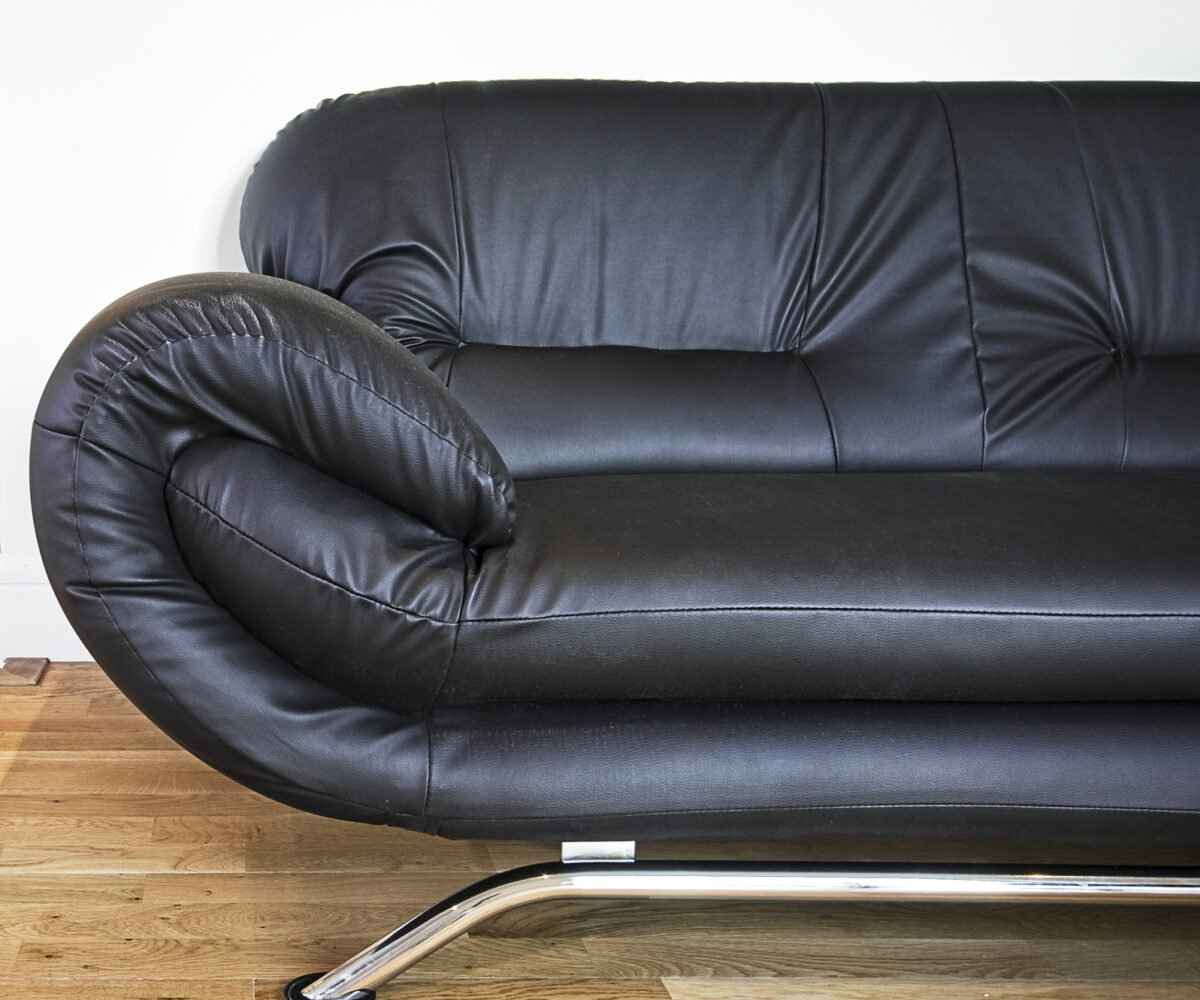 A black leather sofa.