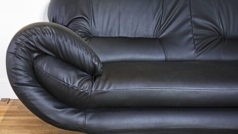 A black leather sofa.