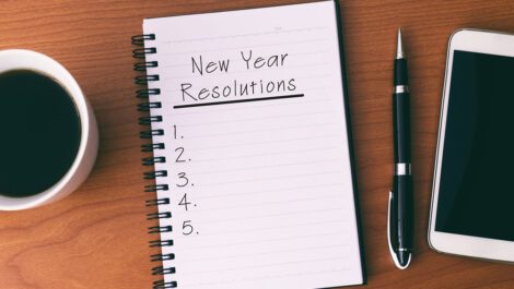 A journal with a New Year's resolutions list.