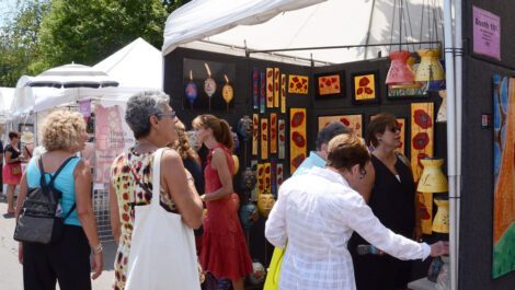 People looking at art at the Ann Arbor Art Fair.