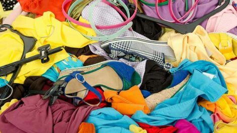 A big pile of clothes and shoes.