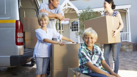Young family moving out of their house.