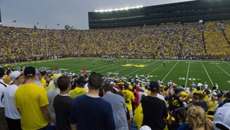 Crowd watching a football game at the University of Michigan.
