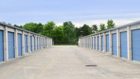 Row of drive-up access storage units at Abbey Road Self Storage.